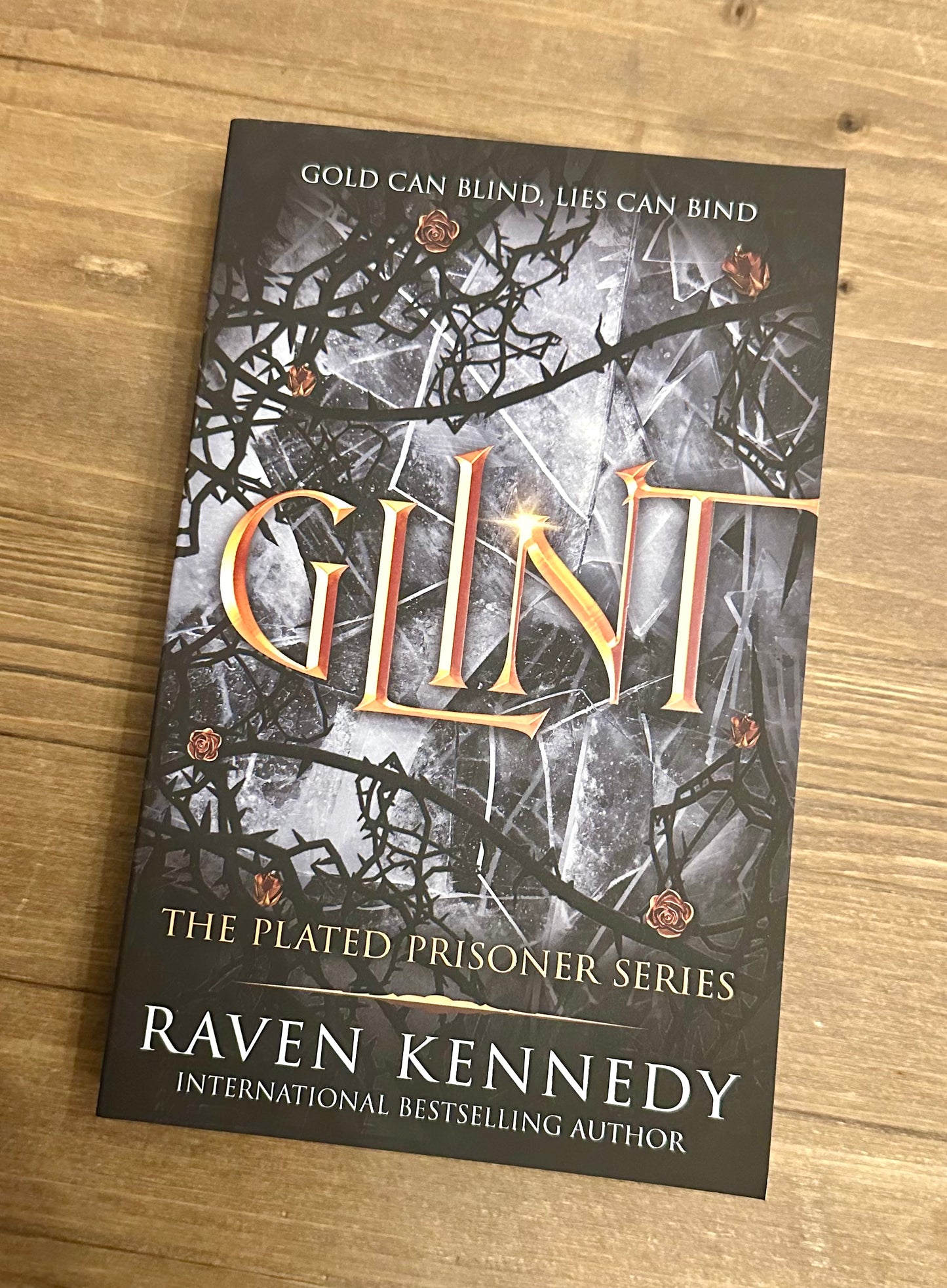 Glint by Raven Kennedy (The Plated Prisoner #2) - Paperback