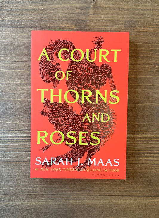 A Court of Thorns and Roses (A Court of Thorns and Roses #1) by Sarah J. Maas - Paperback